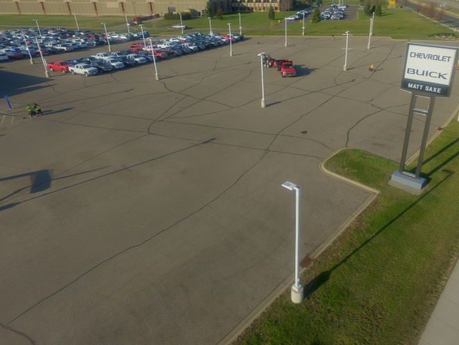 Before — Car Dealership Lot – Belle Plaine